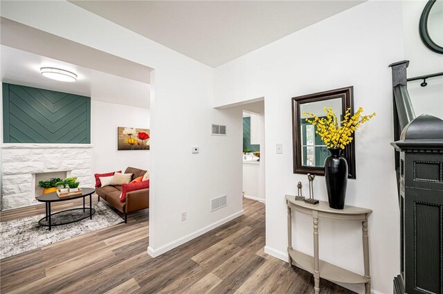 corridor featuring hardwood / wood-style floors