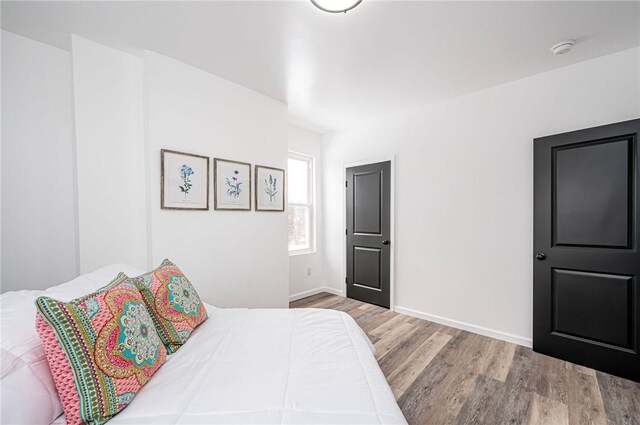 bedroom featuring hardwood / wood-style floors