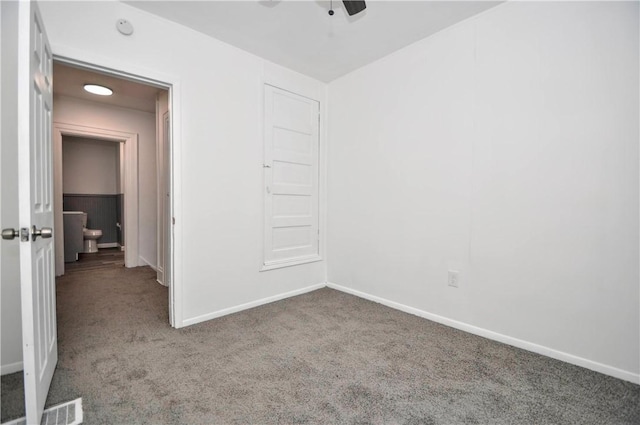 unfurnished room with carpet flooring