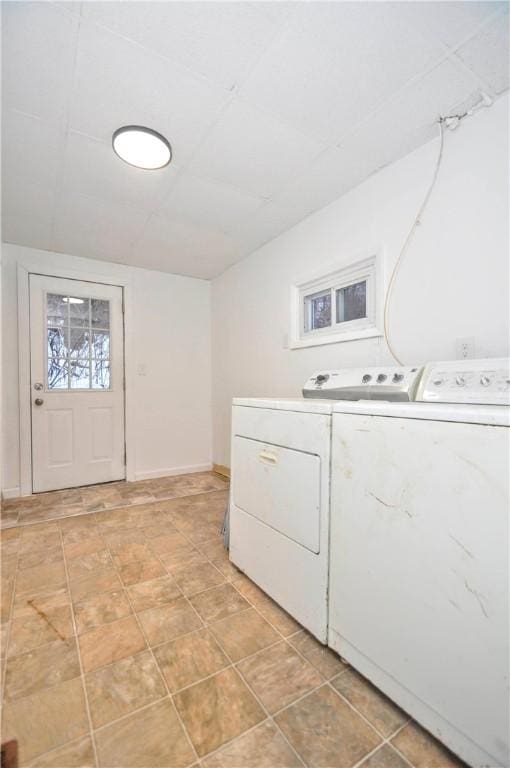 laundry room with washer and dryer