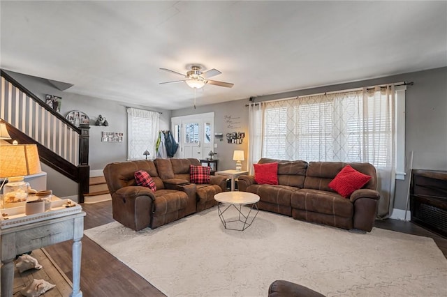 living room with ceiling fan and hardwood / wood-style floors