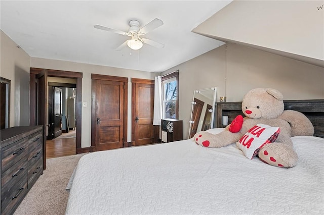 bedroom with ceiling fan and carpet floors