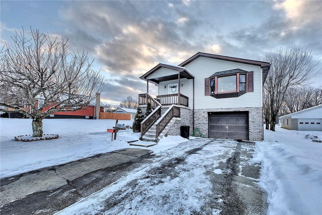 view of front of home with a garage