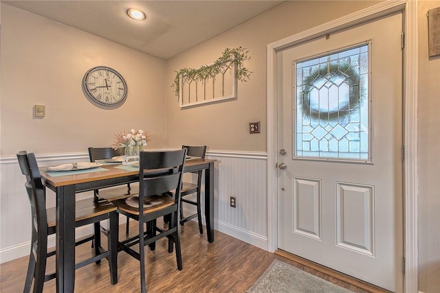 dining area with wood-type flooring