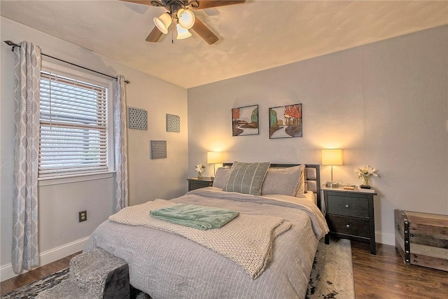 bedroom with wood-type flooring and ceiling fan