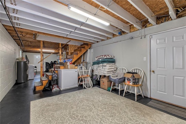 garage featuring refrigerator and electric water heater