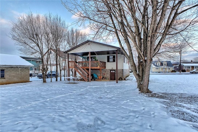 view of yard layered in snow