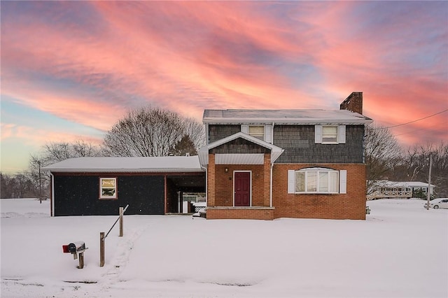 view of front of property featuring brick siding