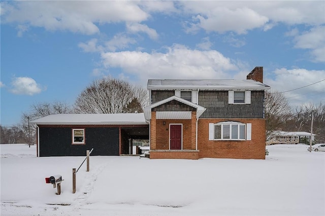 view of front facade featuring brick siding