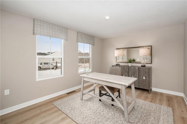 office space featuring light hardwood / wood-style floors