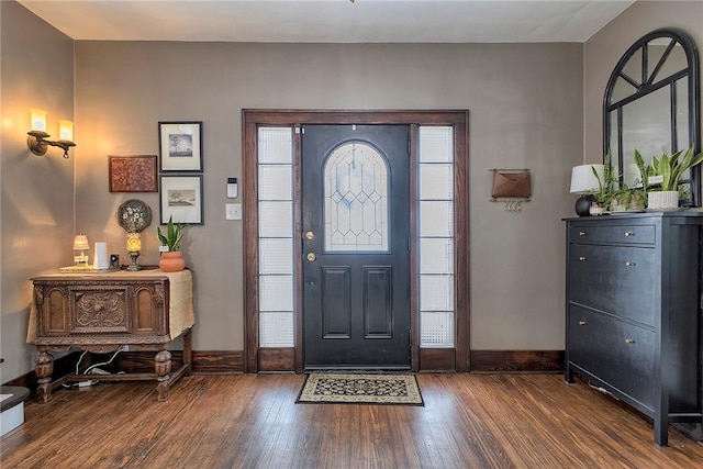 foyer featuring dark wood-type flooring