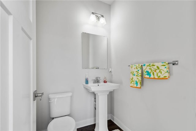 bathroom with sink and toilet