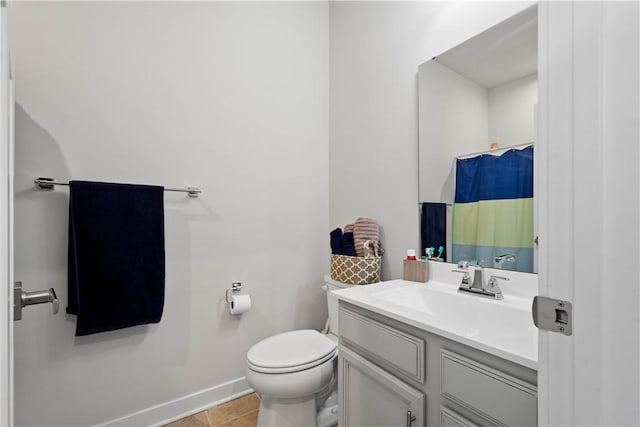 bathroom featuring vanity, tile patterned flooring, toilet, and a shower with curtain