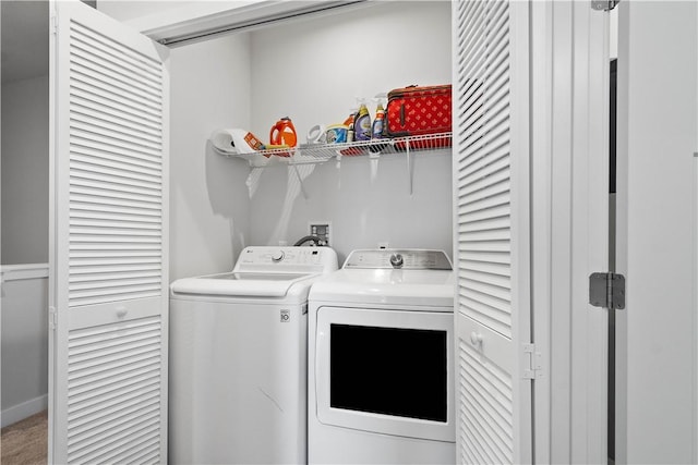 washroom with washer and clothes dryer