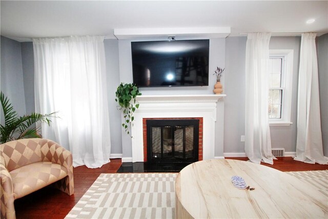 living area featuring dark wood-type flooring