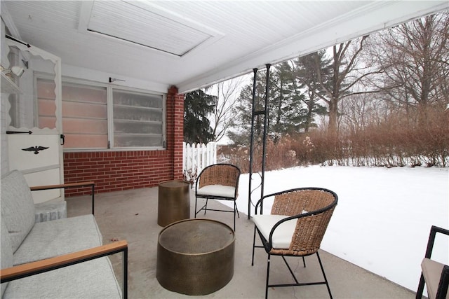 view of snow covered patio