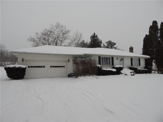 single story home featuring a garage