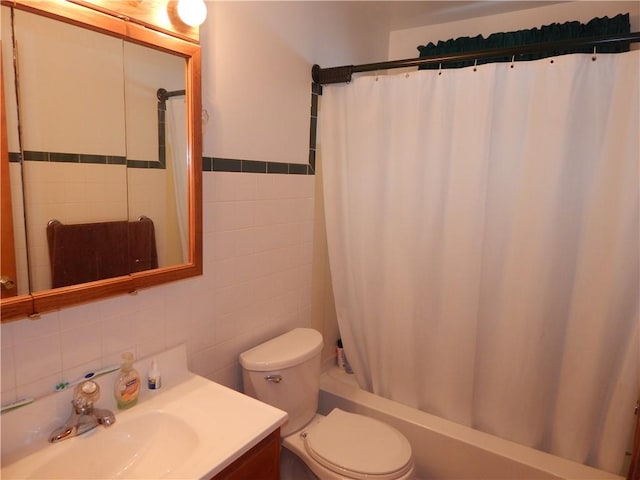 full bathroom with vanity, shower / bath combination with curtain, decorative backsplash, tile walls, and toilet