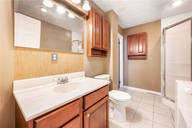 bathroom featuring toilet, tile patterned floors, an enclosed shower, and vanity