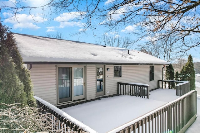 view of snow covered property