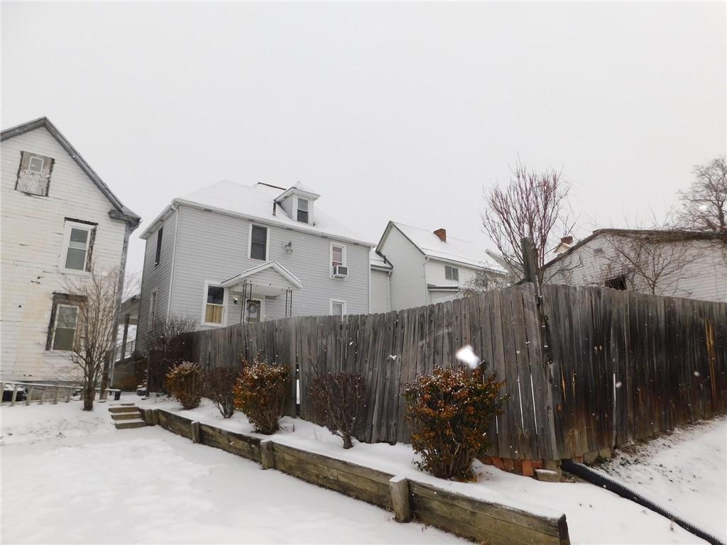 view of yard covered in snow