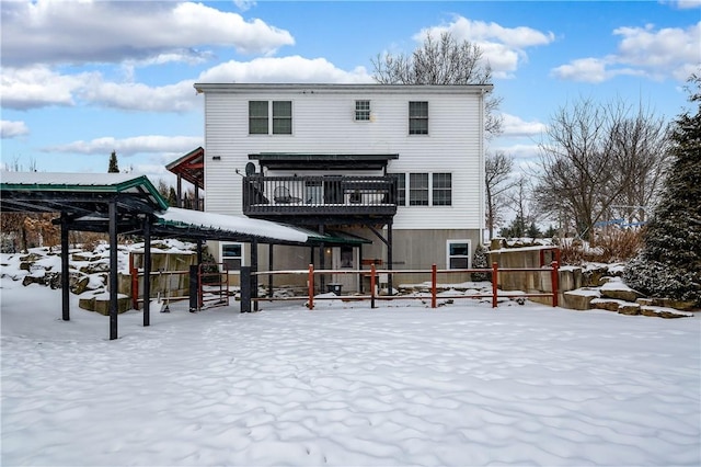 view of snow covered house