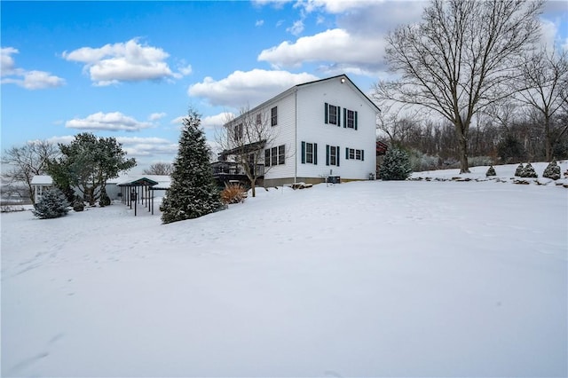 view of snow covered property