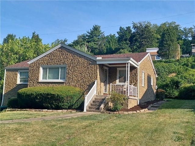 view of front of home with a front lawn