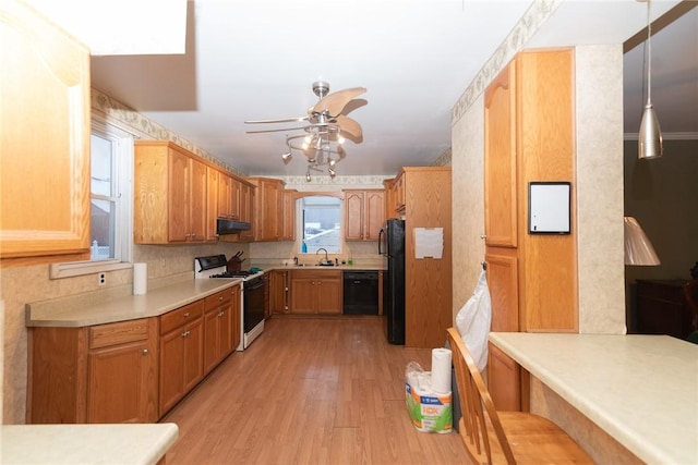 kitchen with ceiling fan, tasteful backsplash, light wood-type flooring, pendant lighting, and black appliances