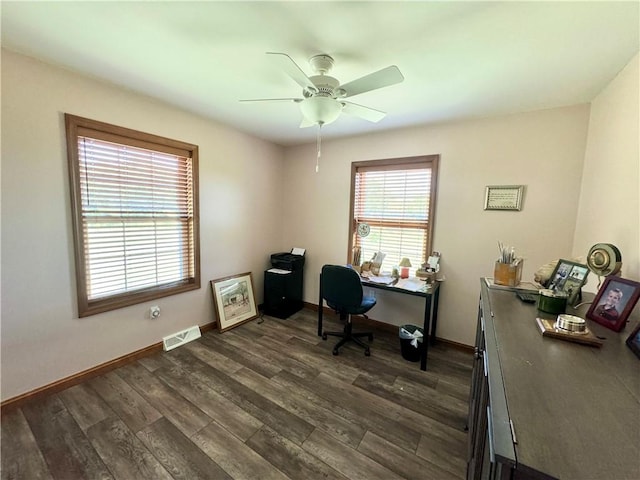 office with ceiling fan and dark hardwood / wood-style flooring