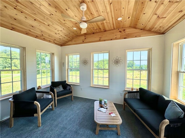 sunroom / solarium with ceiling fan, wood ceiling, and vaulted ceiling