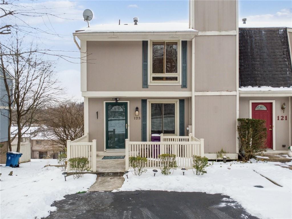 multi unit property featuring covered porch