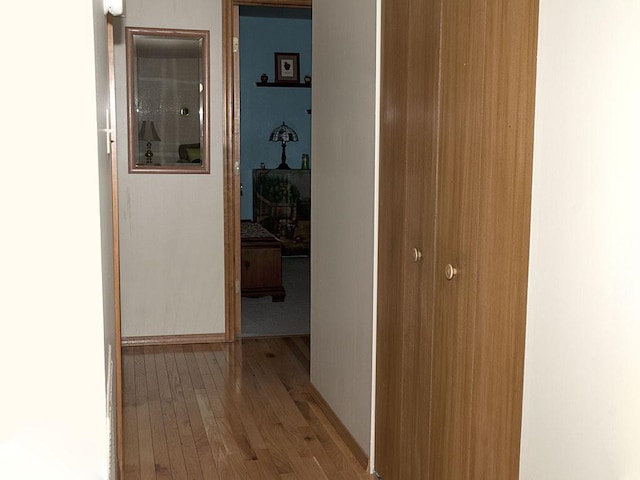 hallway featuring light wood-type flooring