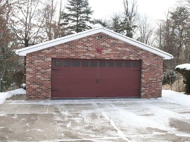 view of snow covered garage