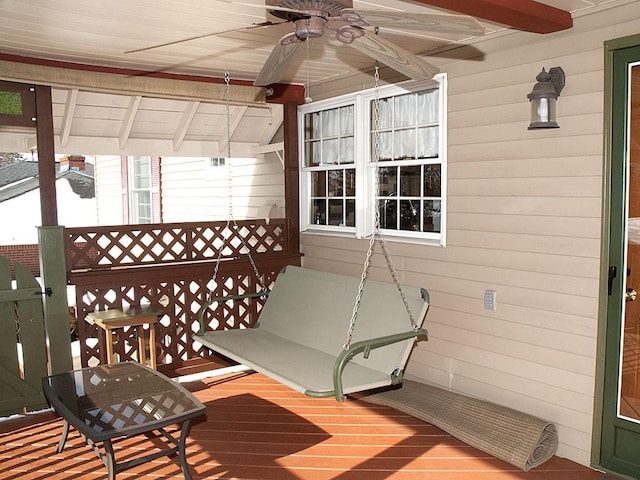 wooden deck with ceiling fan