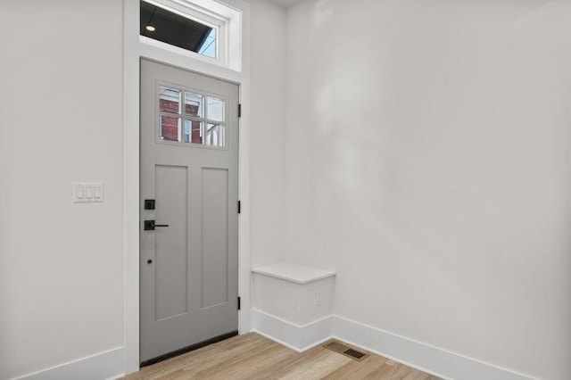 entrance foyer featuring light hardwood / wood-style floors