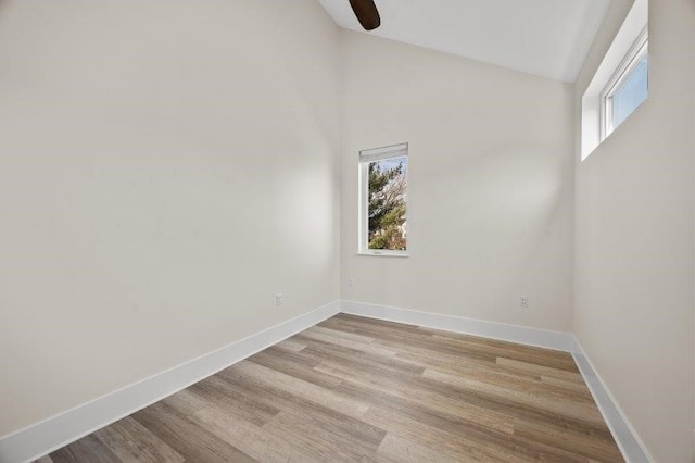 spare room with ceiling fan and light hardwood / wood-style floors