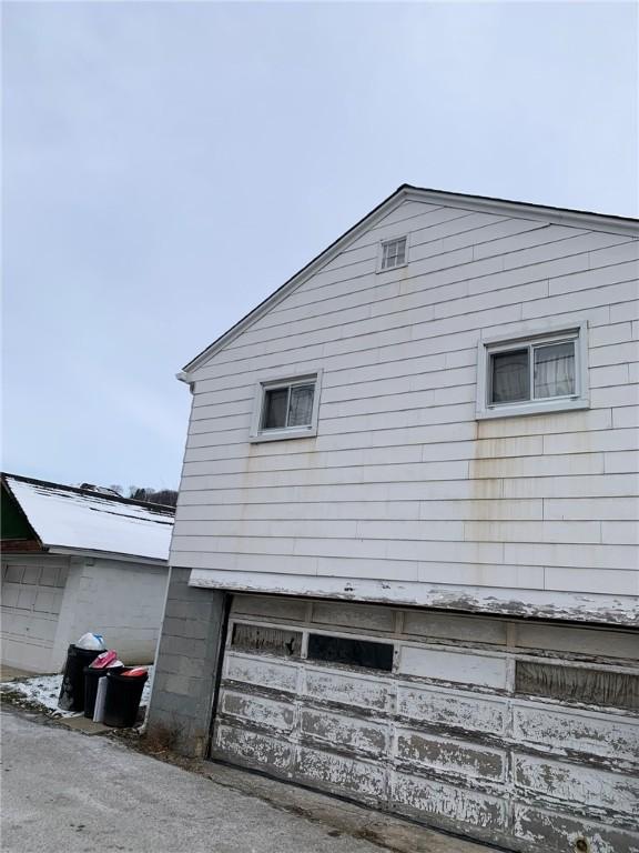 view of home's exterior featuring a garage