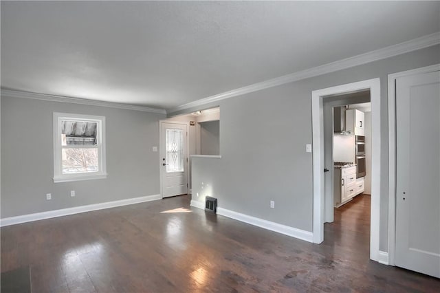 interior space featuring dark hardwood / wood-style floors and crown molding