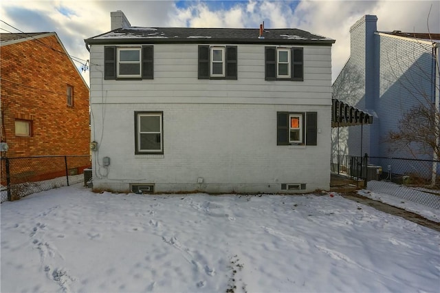 view of snow covered property