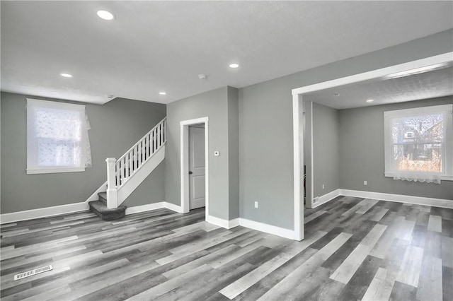 spare room featuring hardwood / wood-style floors