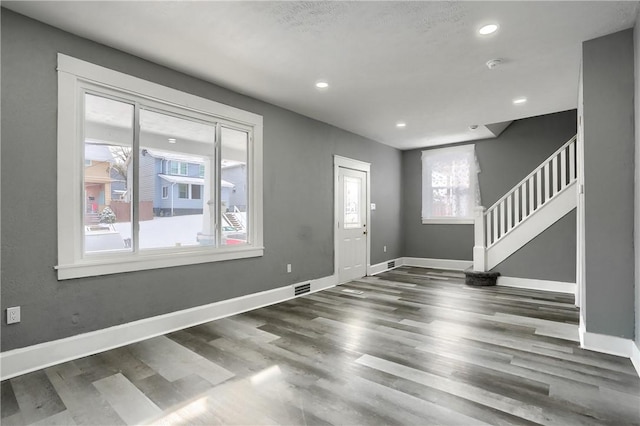 foyer featuring dark hardwood / wood-style flooring