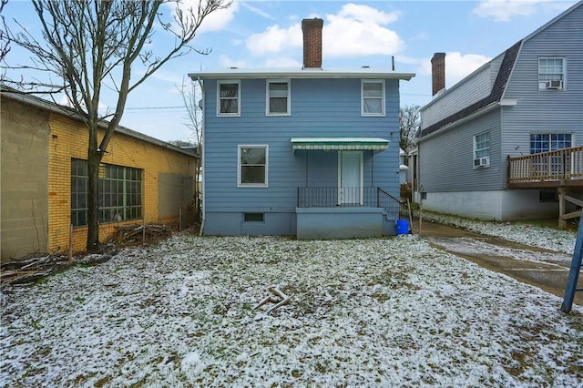 view of snow covered property