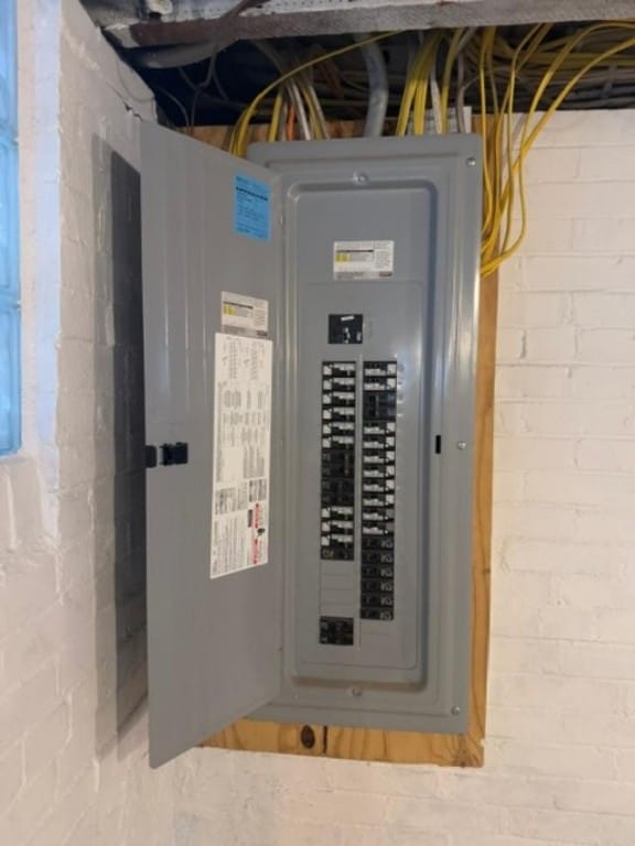 utility room featuring electric panel