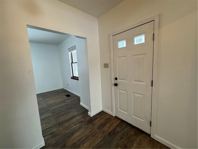 entrance foyer featuring dark wood-type flooring