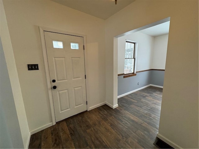 foyer with dark hardwood / wood-style flooring