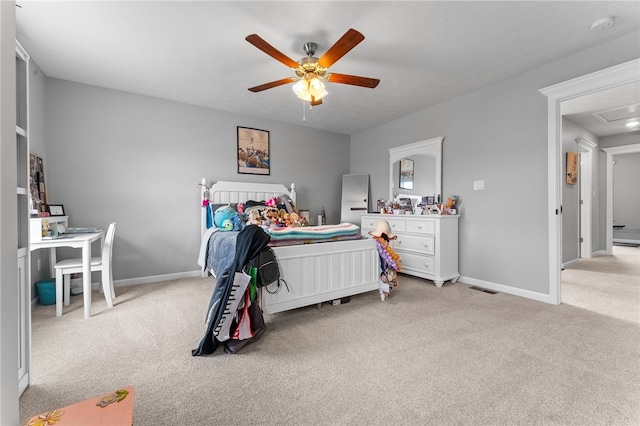 bedroom with ceiling fan and light colored carpet