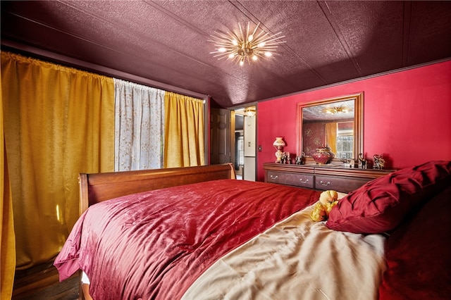 bedroom featuring a chandelier