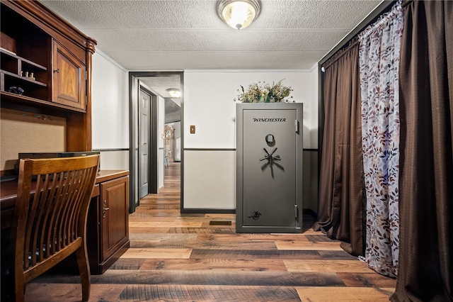 kitchen with dark wood-type flooring