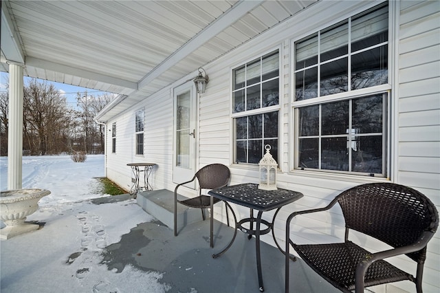 view of snow covered patio